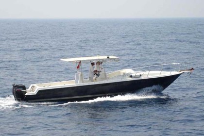 Fiber fishing boat Surabaya : P - 10.00m, L - 2.65m, T - 3.00m, outboard engine 2 x 140 HP